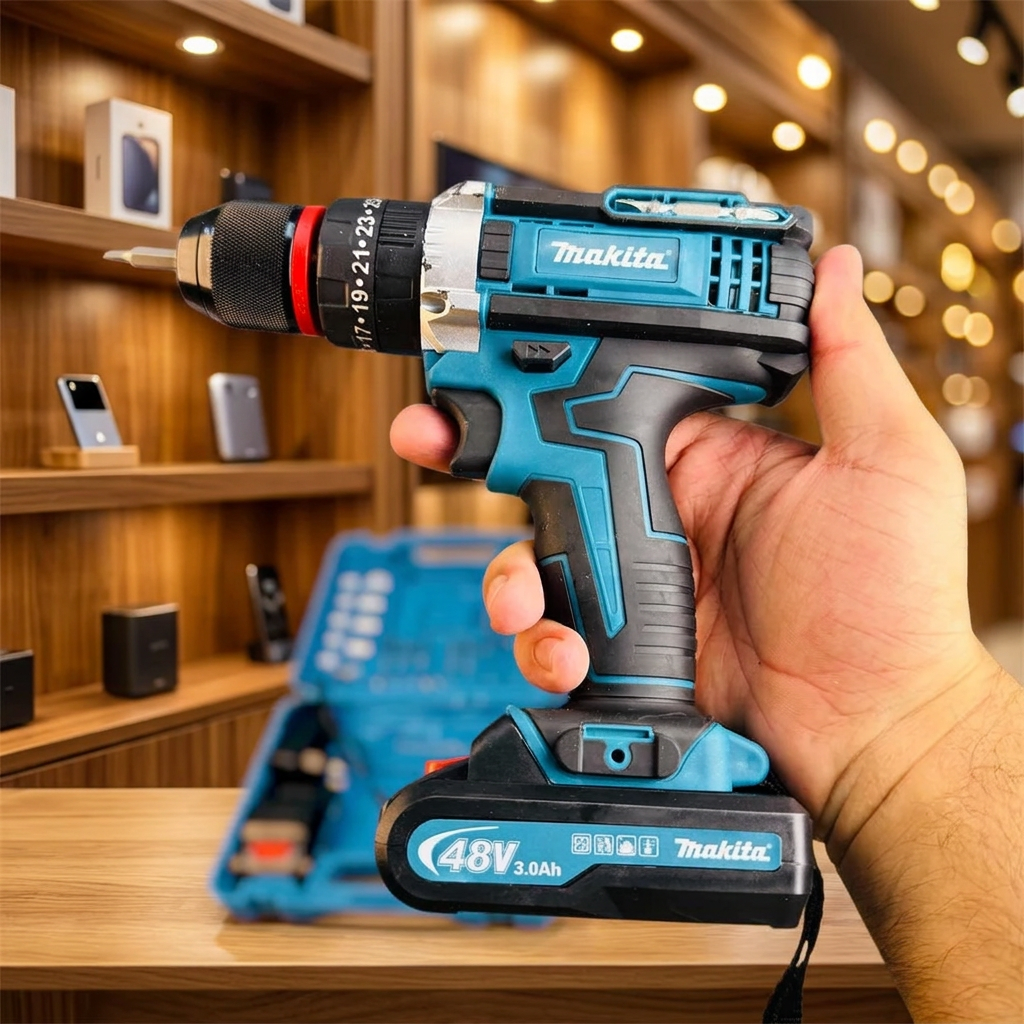 Makita cordless drill held in hand